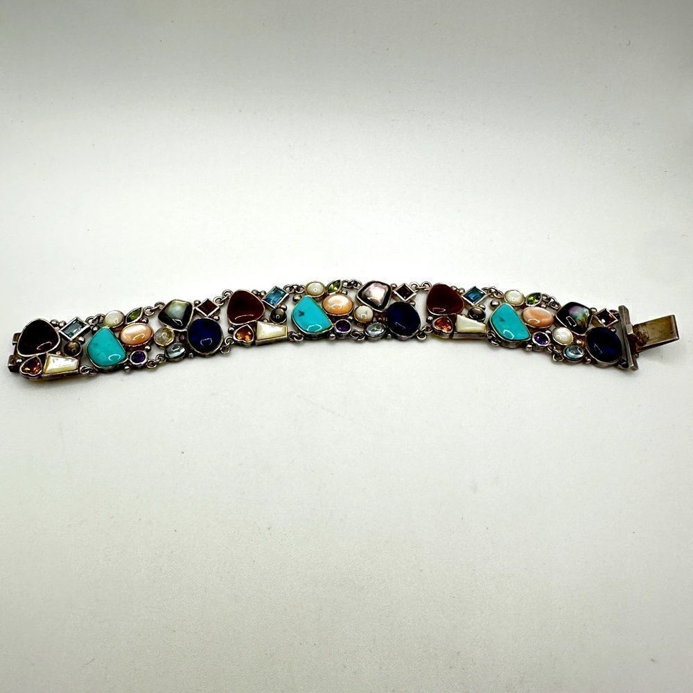7.5" Mult-gemstone and shell stamped sterling silver bracelet!